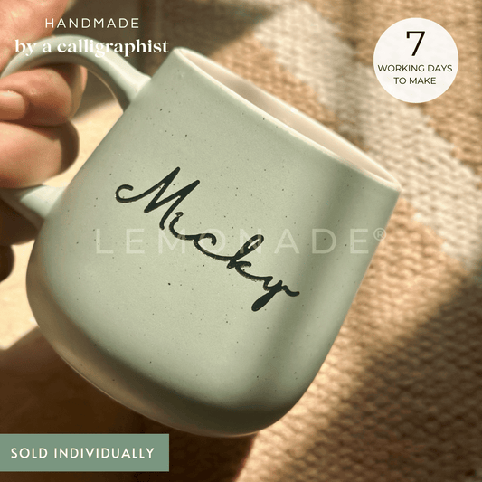 Personalized pastel ceramic coffee mug with cursive text from the Artisan Collection.