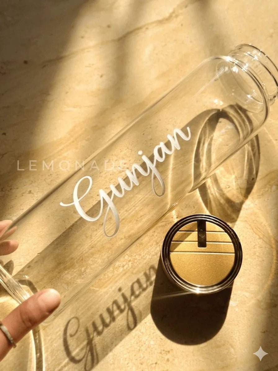 Detailed view of the custom glass bottle with the detached gold cap