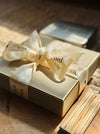 Personalized satin ribbon in cream color for custom gift wrapping and branding from Lemonade India.