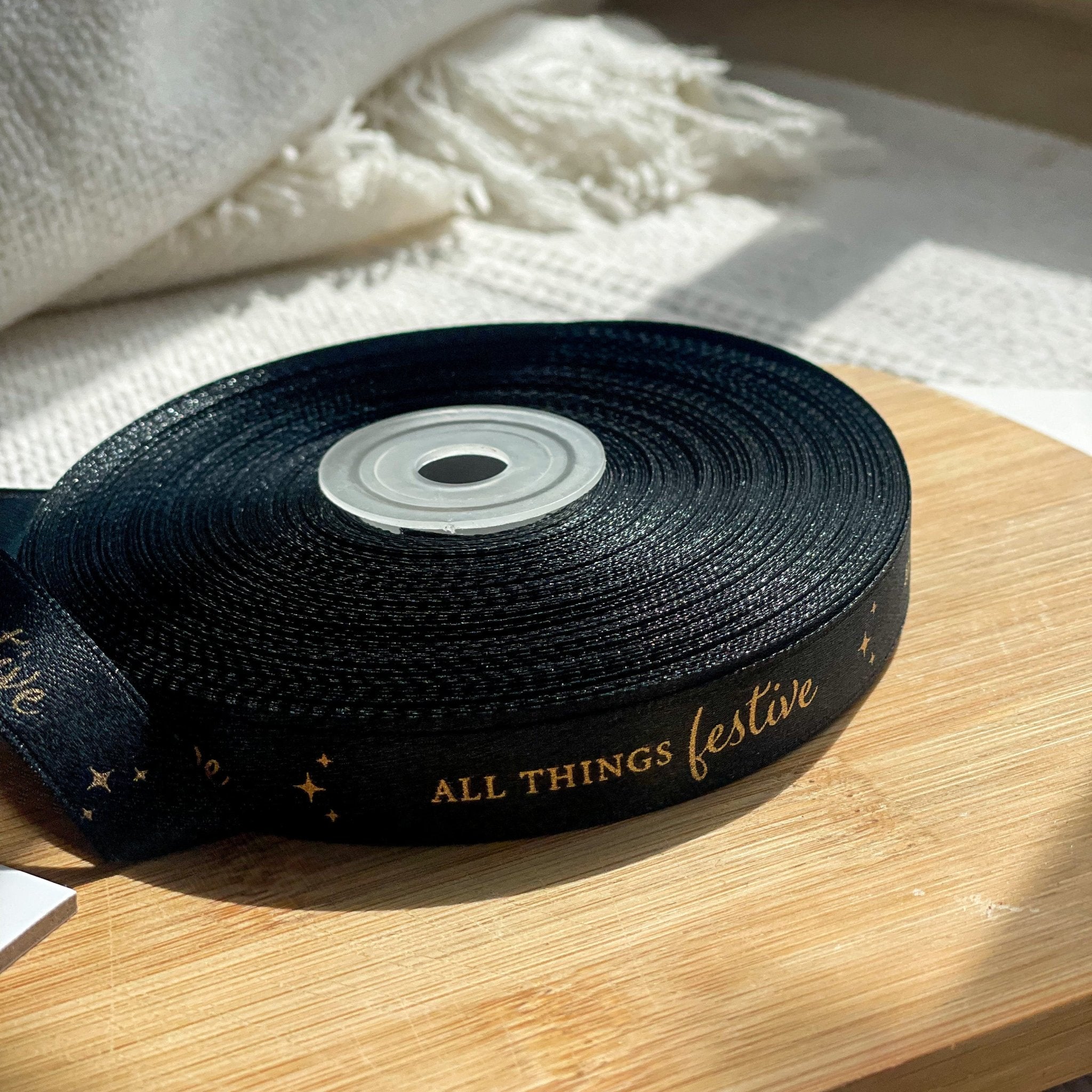 Pre-designed festive ribbon with printed designs for gift wrapping and decorations.
 All Things Festive - Black - LemonadeStationery