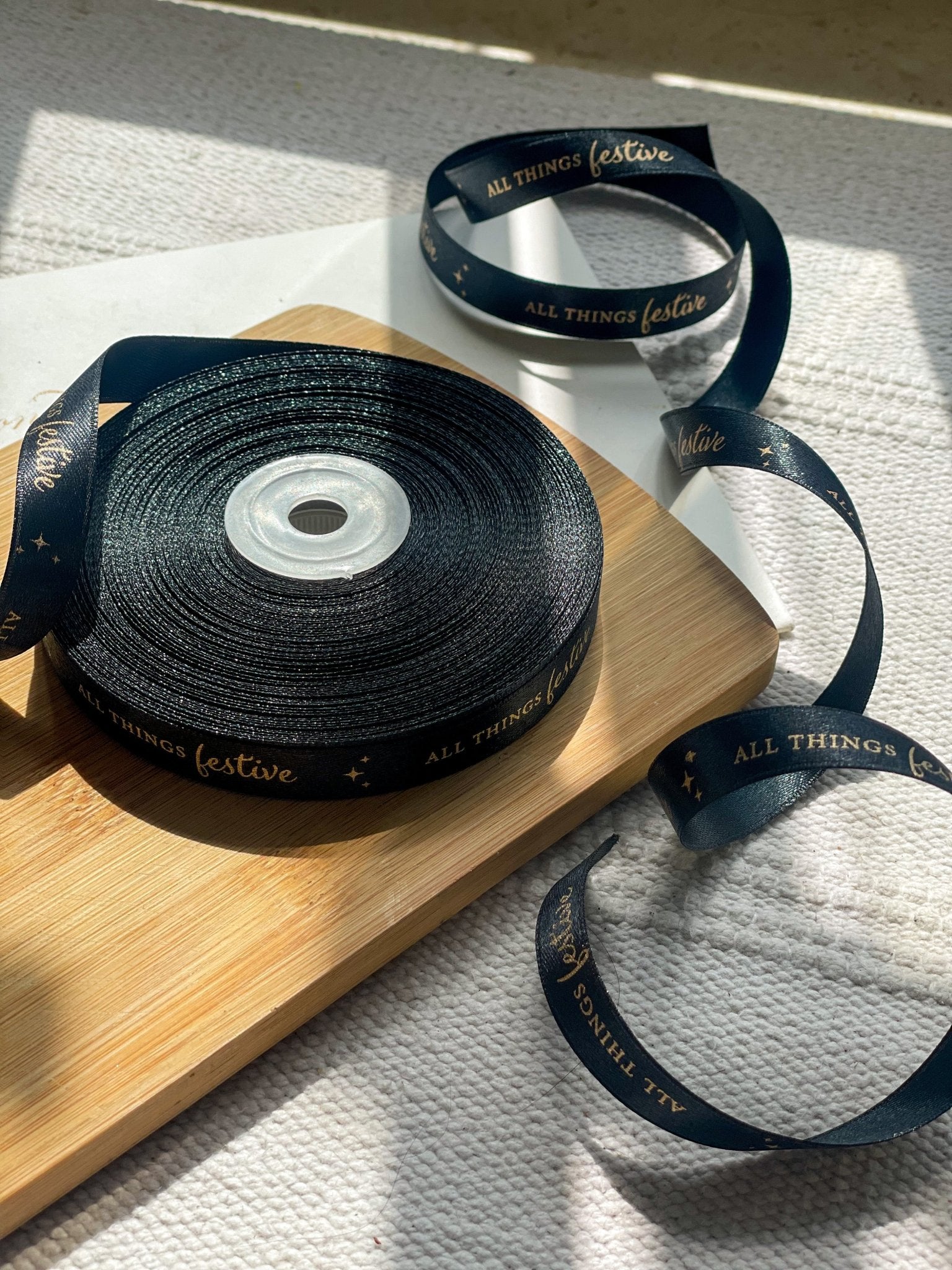 Pre-designed festive ribbon with printed designs for gift wrapping and decorations.- Lemonade Stationery  
All Things Festive - Black LemonadeStationery