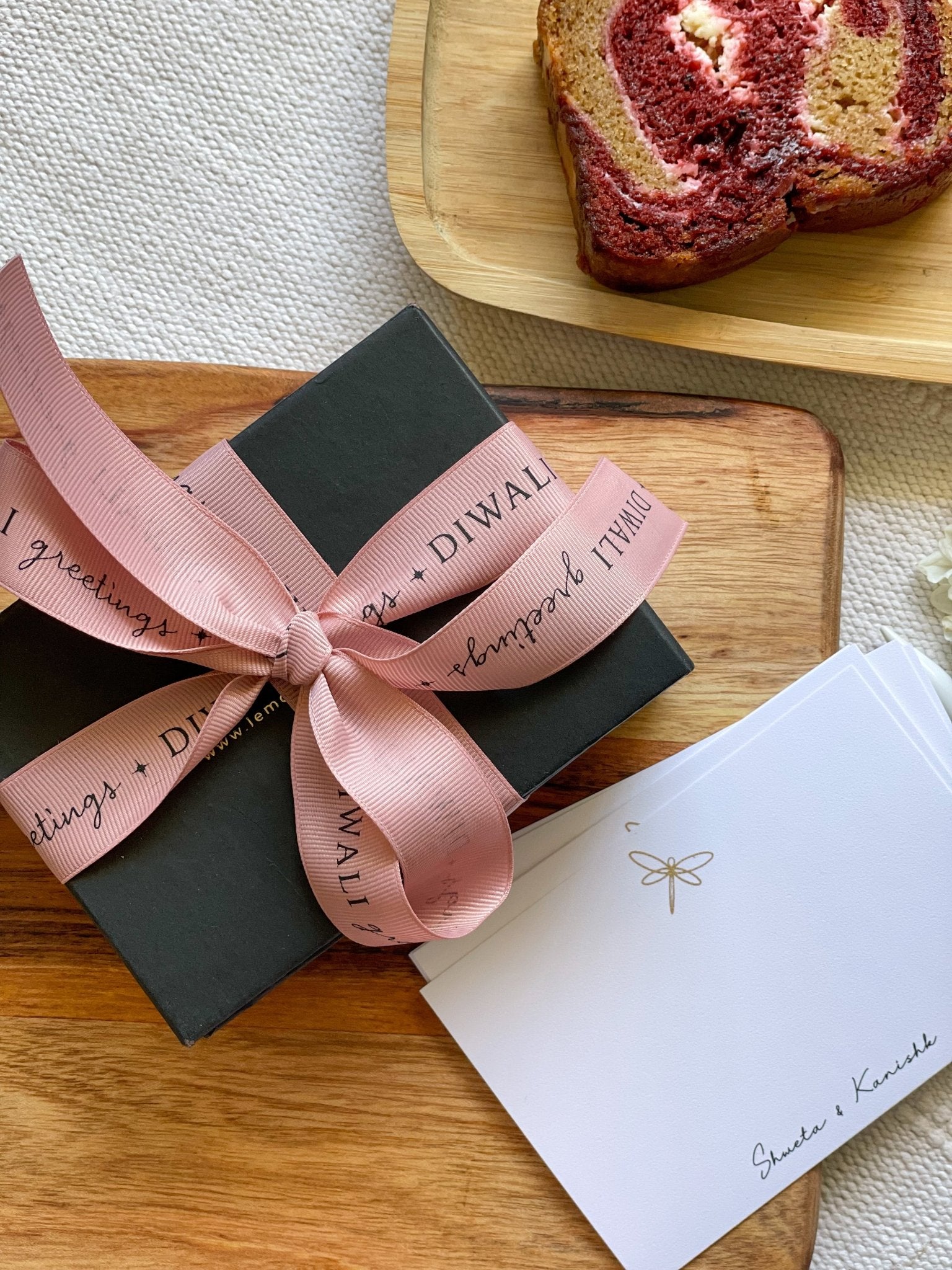 Pre-designed festive ribbon with printed designs for gift wrapping and decorations.
Diwali Greetings - Pink LemonadeStationery