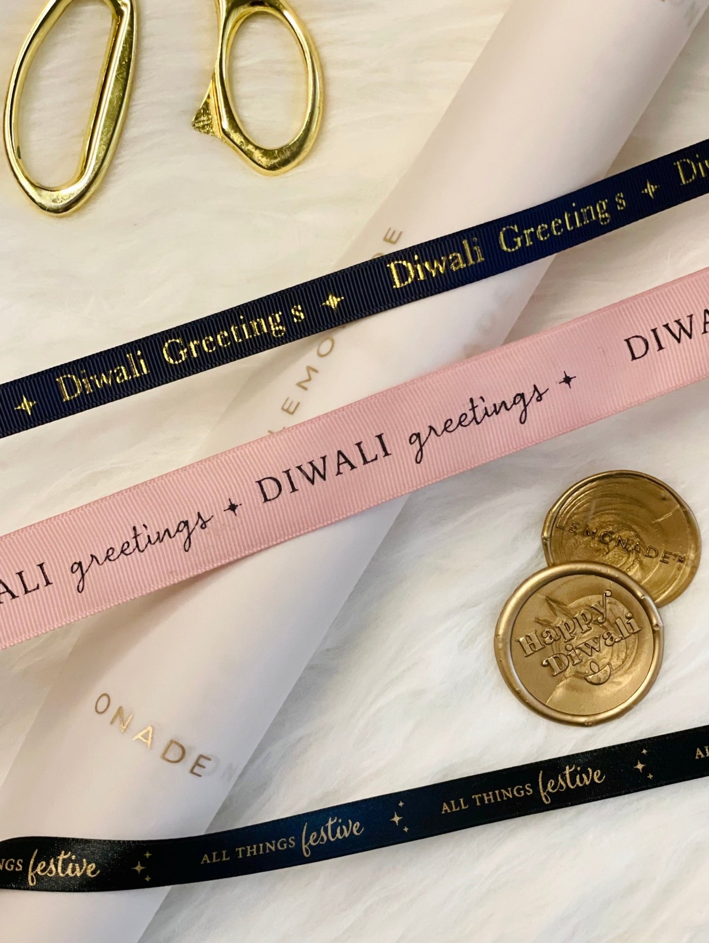 Pre-designed festive ribbon with printed designs for gift wrapping and decorations. Diwali Greetings - Pink
LemonadeStationery
