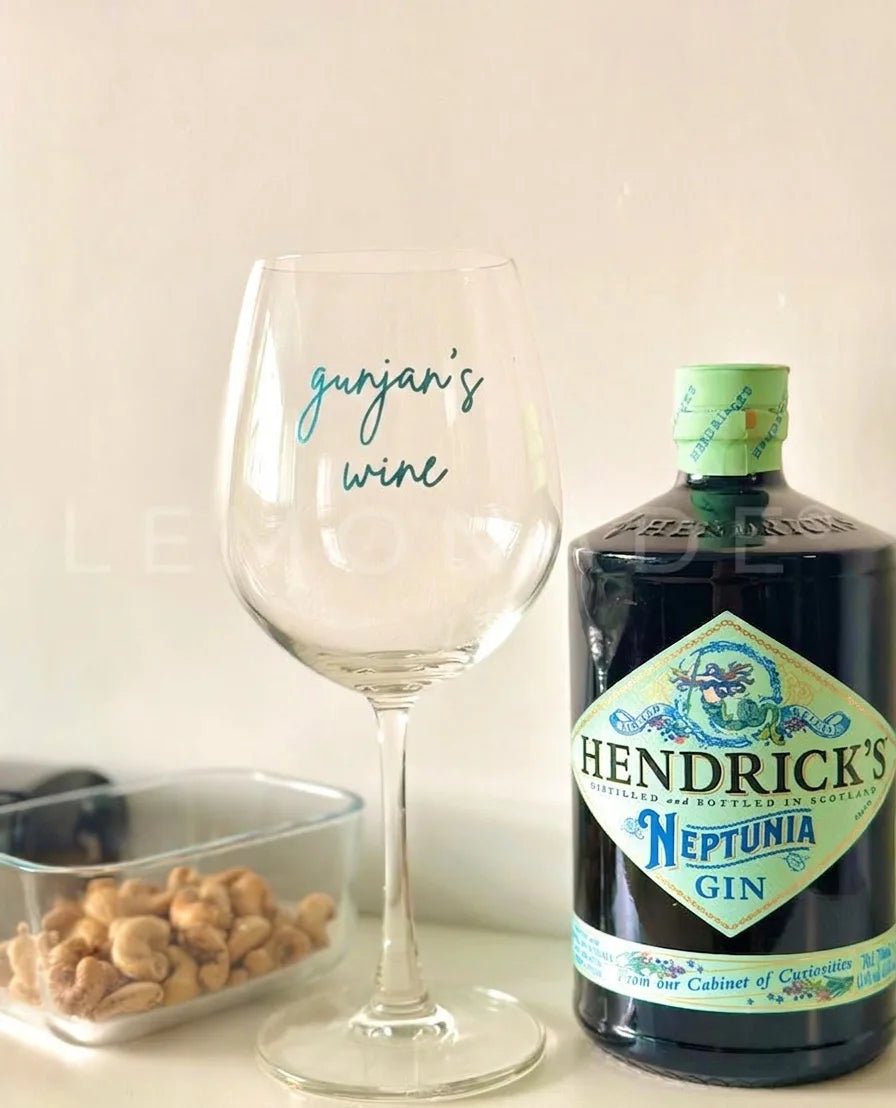 Elegant wine glass set of 2 styled with luxury gin and snacks