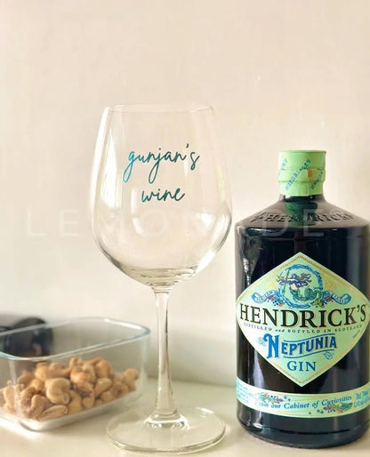 Elegant wine glass set of 2 styled with luxury gin and snacks