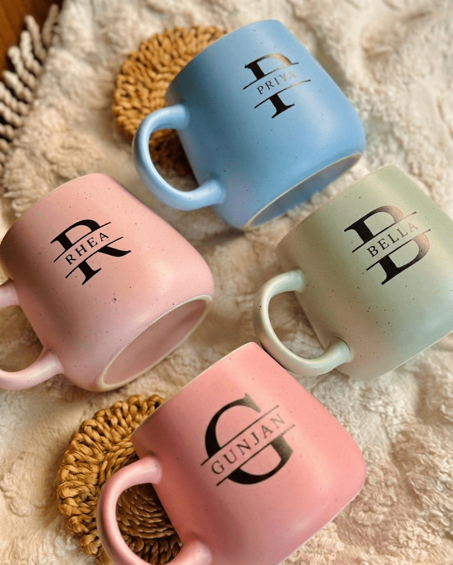 Set of 4 personalized initial mugs styled 