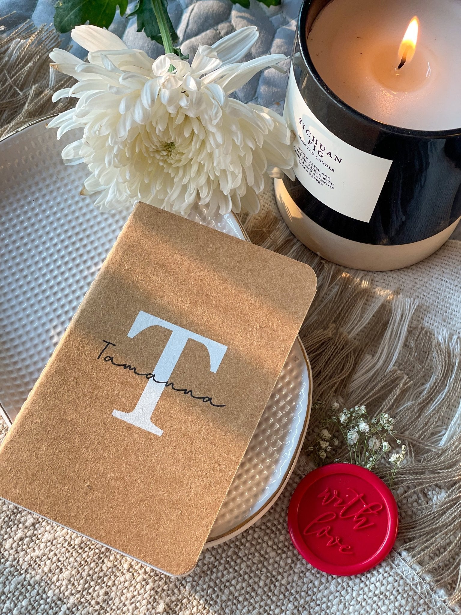 Compact and eco-friendly mini notebook featuring a customizable initial on the cover.