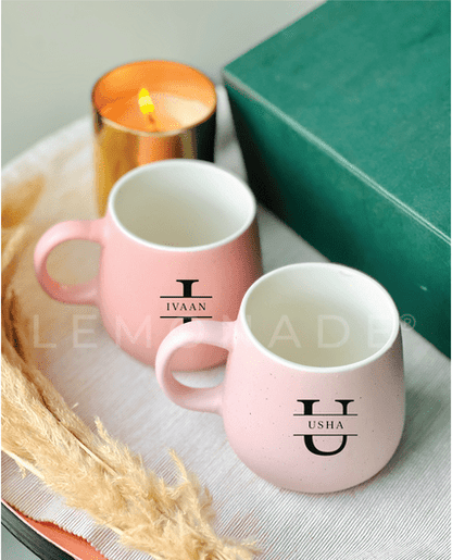Close up of premium monogram engraving on an assorted pastel mug