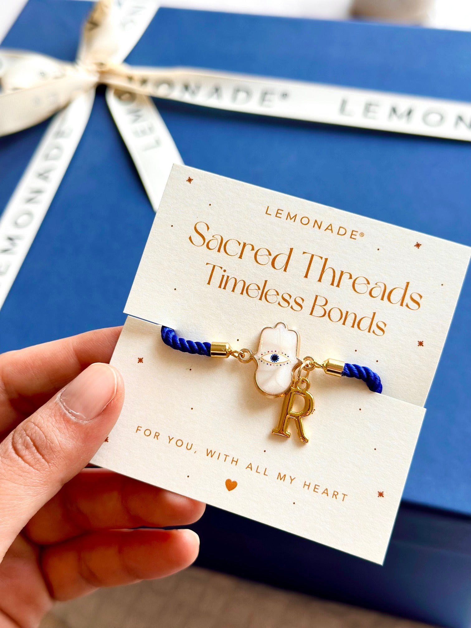 Personalized - Rakhi - Hamsa White With Initial - Assorted Thread - Sold Individually - Lemonade