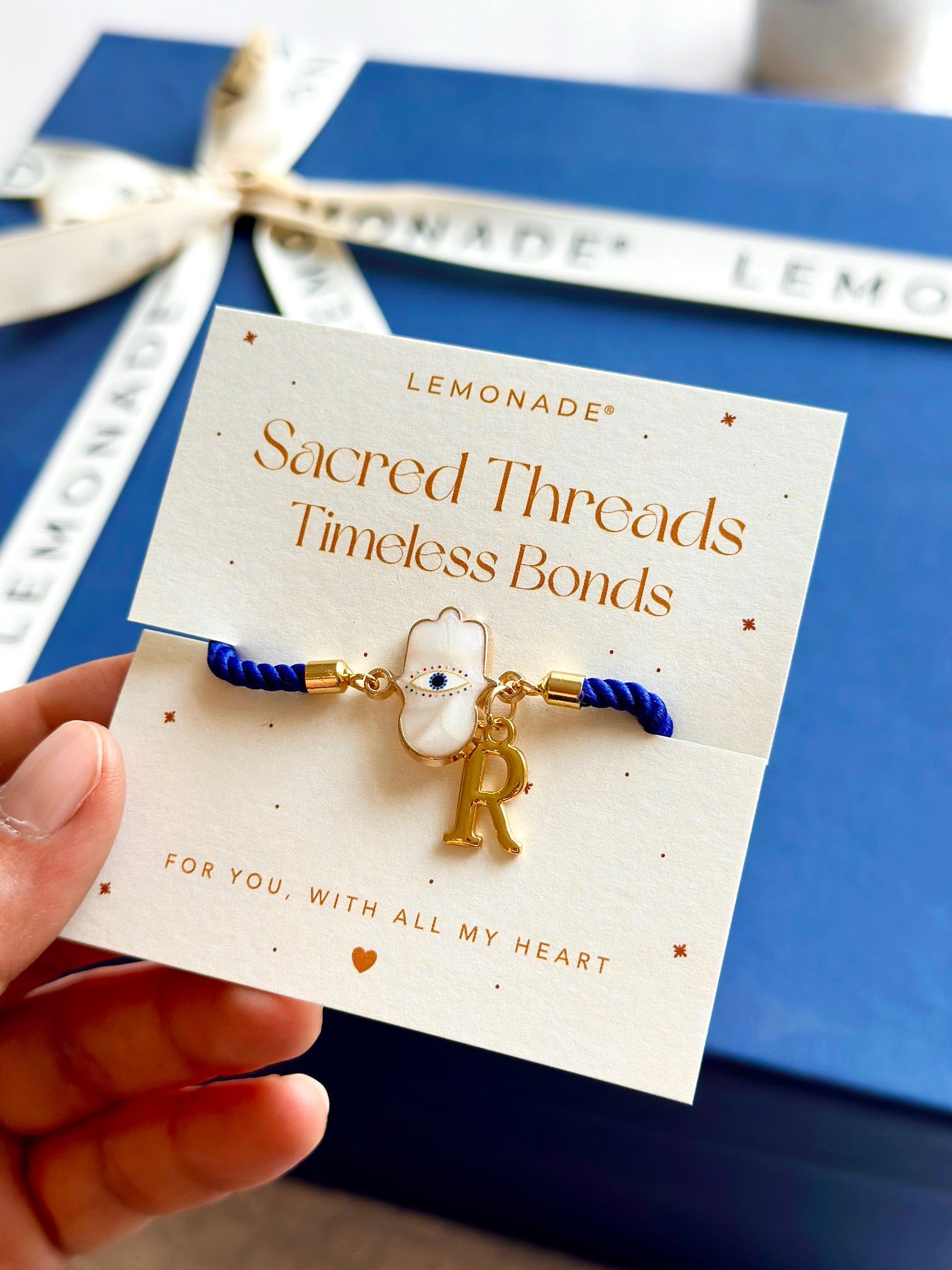 Personalized - Rakhi - Hamsa White With Initial - Assorted Thread - Sold Individually - Lemonade