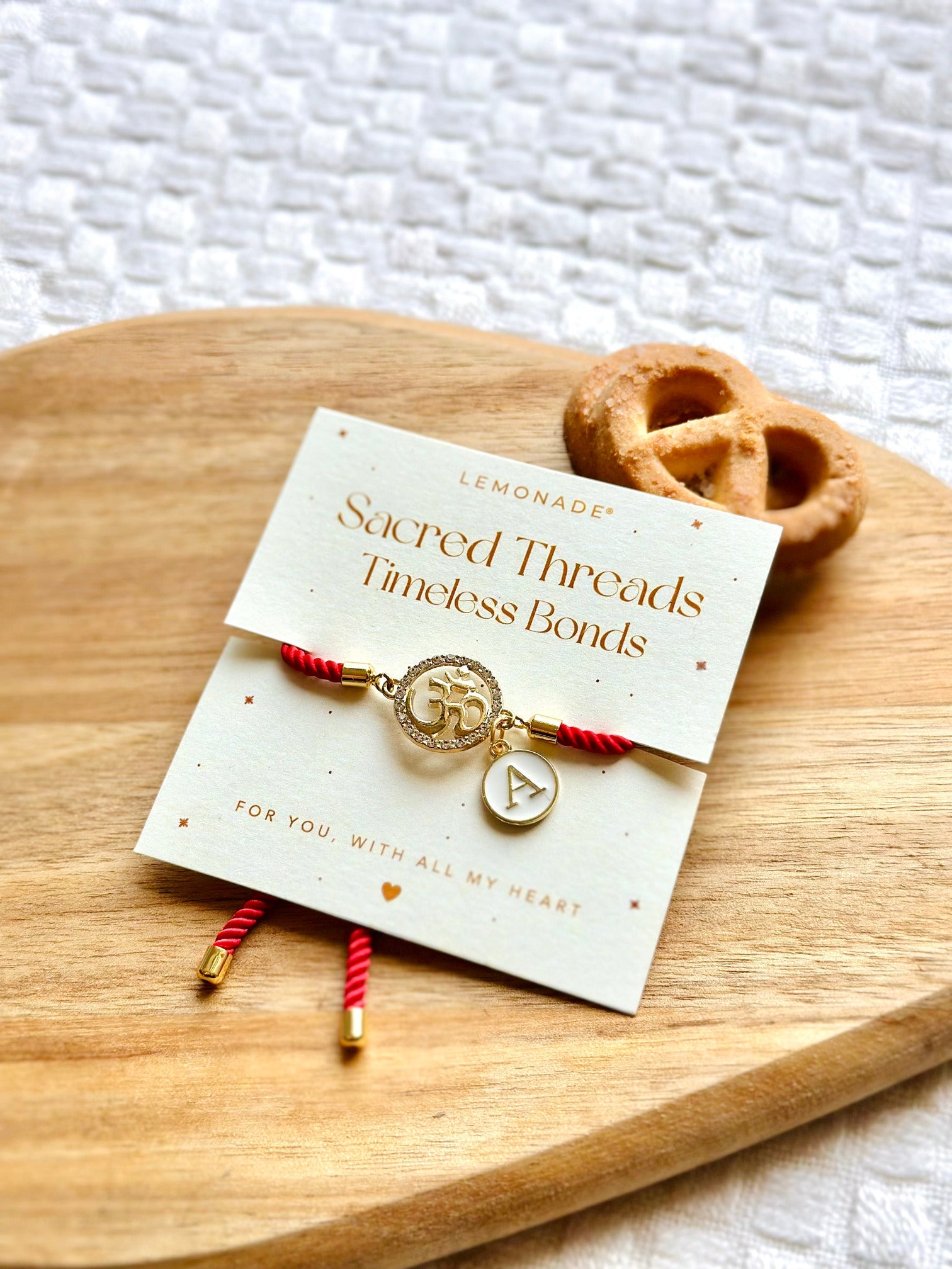 Personalized - Rakhi - OM With Charm - Assorted Thread - Sold Individually - LemonadeLuxe Gifting