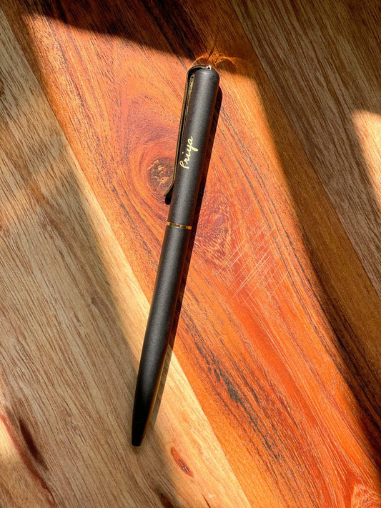 Custom roller pen with blue ink and smooth, durable design.