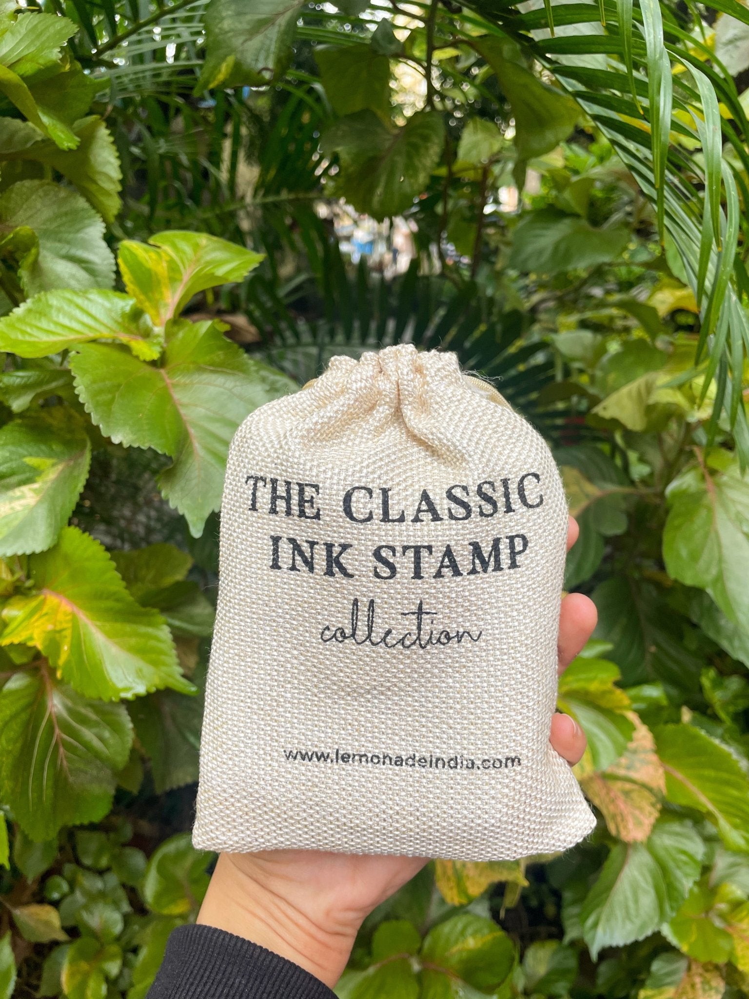 Personalized rubber stamp with wooden handle, perfect for business packaging and branding