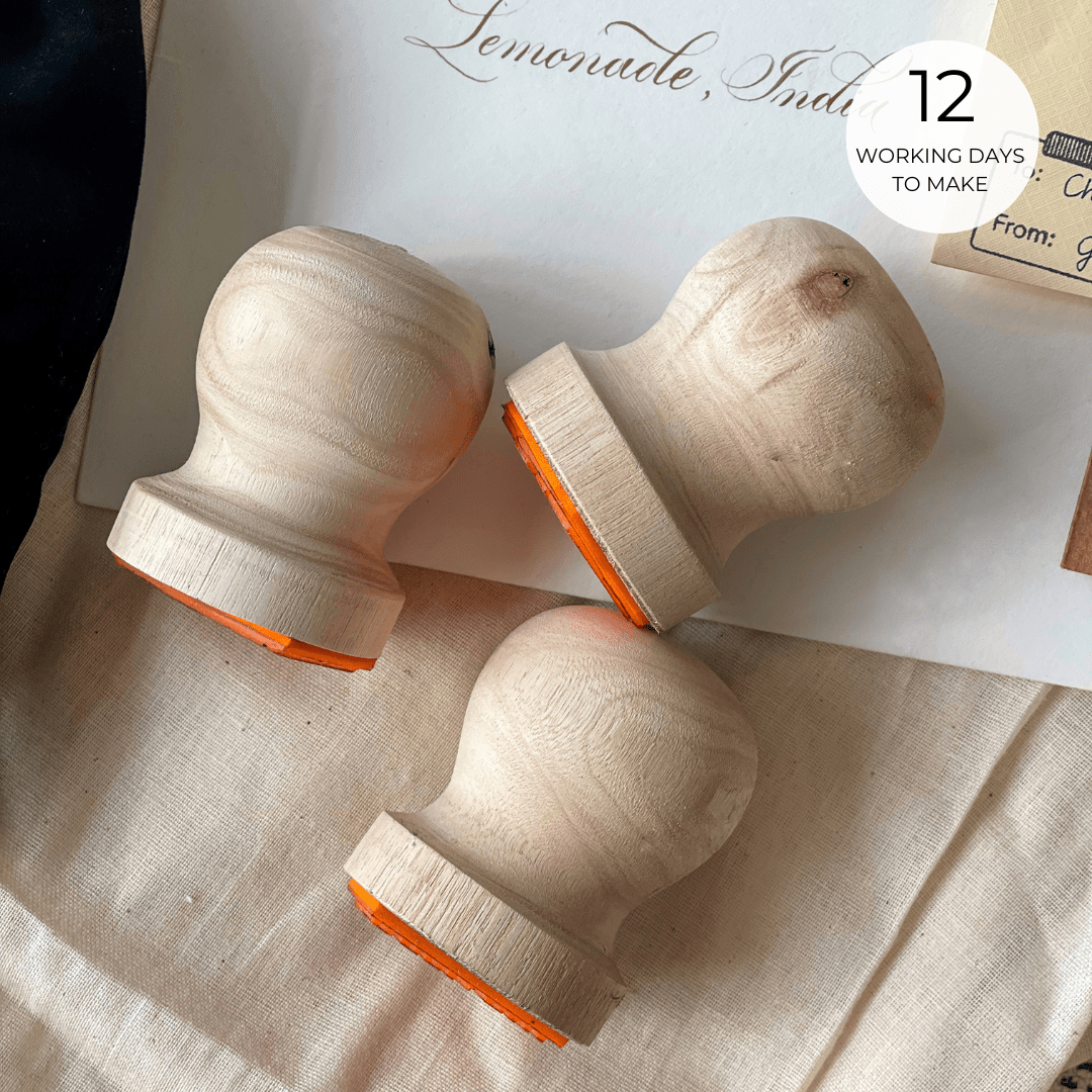 Custom wooden handle rubber stamp for small business branding and logos.