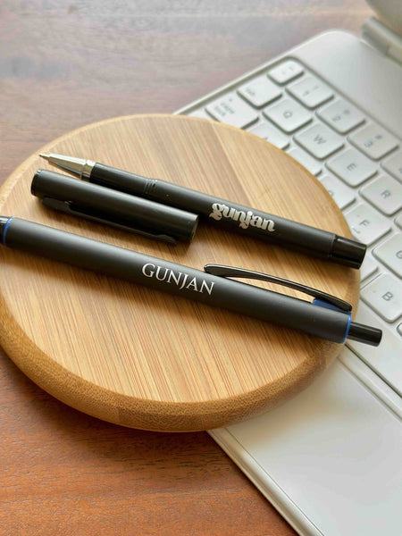 Custom engraved name pen in blue ink