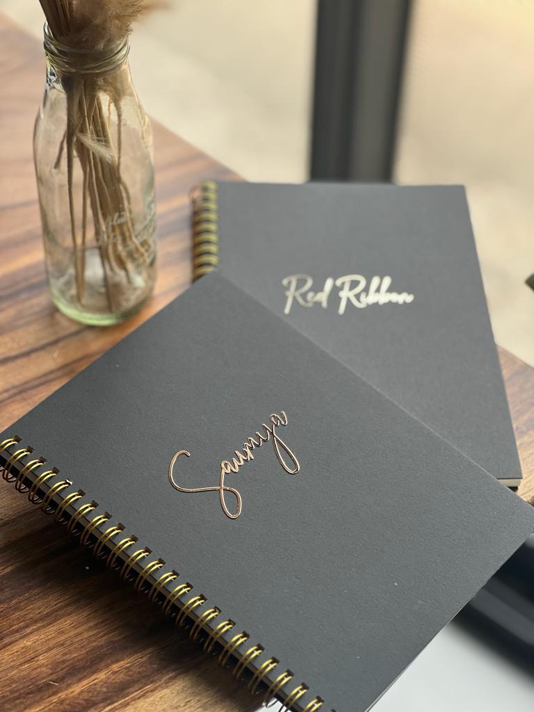 Stylish spiral notebook with personalized gold foil for daily notes