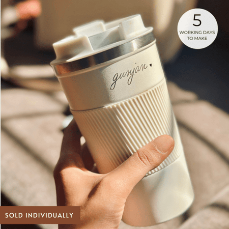 Personalized travel mug featuring custom cursive text for a unique touch.