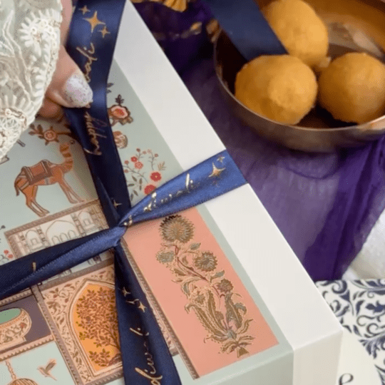 Pre-designed festive ribbon with printed designs for gift wrapping and decorations.  Gold Foiled Satin Ribbon LemonadeStationery