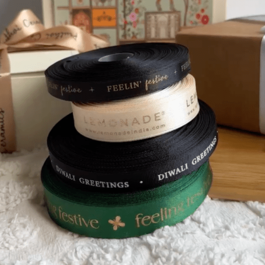 Pre-designed festive ribbon with printed designs for gift wrapping and decorations.
Gold Foiled Satin Ribbon LemonadeStationery